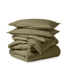 four pillows stacked on top of each other