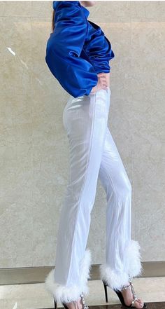 High waist trouser fit Features lush feather trim along hem Slit hem for flarred fit Front botton clousure 100% Polyester White Pant, Feather Trim, High Waisted Trousers, White Pants, Colorful Fashion, Lush, High Waist, Trousers, High Waisted