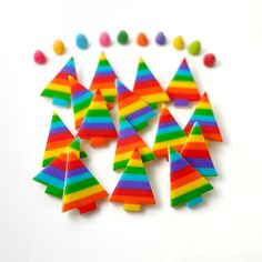 'Tis the season to savor the sweetness of the holidays, and our Christmas Rainbow Pride trees are here to make your celebrations extra special. Handcrafted with love and care, these delightful treats are a true symbol of Yuletide cheer. Each one is a striped masterpiece, celebrating the diversity of the holiday season. Our vibrant, rainbow-colored designs reflect the spirit of inclusivity, acceptance, and unity. We are happy to be spreading love and joy to everyone, regardless of their backgroun Pride Christmas, Christmas Rainbow, Custom Gift Cards, Table Place Settings, Rainbow Pride, Marzipan, Spread Love, How To Make Notes, Food Coloring