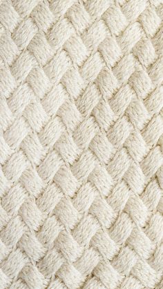 the texture of an upholstered wool material