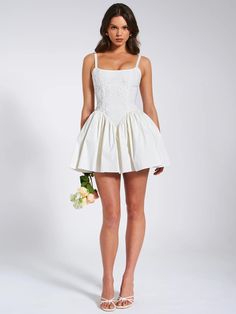 Introducing the alluring Kadi White Cotton Corset Mini Dress, a delightful addition to your wardrobe. Crafted from crisp low stretch Cotton Poplin, this mini dress exudes casual elegance. Delicate lace detailing adorns the garment, adding a touch of charm. The V-shaped waistline and the built-in bones accentuates your figure, while the lace-up back and adjustable stripes ensures a perfect fit. With invisible pockets and mesh bustle inside seamlessly integrated into the design, this dress offers Miss Circle, Satin Corset Dress, Cotton Corset, Vegas Dresses, Waist Corset, Loungewear Dresses, Corset Mini Dress, Event Outfit, Satin Gown