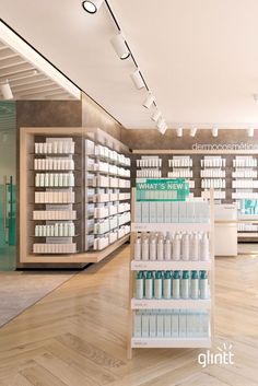 an empty pharmacy store with shelves full of products