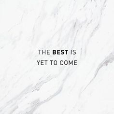 the best is yet to come written in black on a white marble background with text