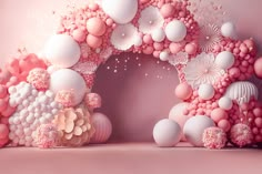 pink and white balloons are arranged in the shape of an arch on a pink background