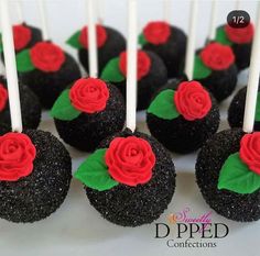 chocolate cake pops decorated with red roses and green leaves