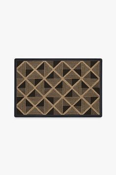 a brown and black rug with geometric design