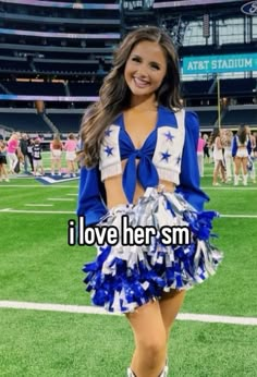 a cheerleader is posing on the field with her name written in blue and white