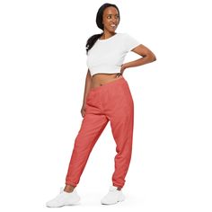 The unisex track pants are your new go-to piece for working out or styling a streetwear outfit. The water-resistant, lightweight fabric and mesh lining provide comfort, while elastic ankle cuffs will make it easy for you to show off your kicks. Style it with a windbreaker for a complete look and feel. * 100% polyester * Fabric weight: 2.21 oz/yd² (75 g/m²) * Lightweight, water-resistant fabric * Fully lined, mesh lining  * Relaxed fit * Elastic waistband and ankle cuffs * Zip pockets * Sits at hip * Blank product sourced from China This product is made especially for you as soon as you place an order, which is why it takes us a bit longer to deliver it to you. Making products on demand instead of in bulk helps reduce overproduction, so thank you for making thoughtful purchasing decisions! Preppy Sweatpants, Women Loose Pants, Pants Preppy, Sports Track Pants, Sweatpants Streetwear, Sports Track, Streetwear Pants, Joggers Pants, Ankle Cuffs