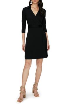 Give your curves a hug in this faux-wrap dress topped by a spread collar and designed with dainty ties. Slips on over head Surplice V-neck Three-quarter sleeves 59% viscose, 21% cotton, 20% modal Dry clean Imported Fitted Black V-neck Belted Dress, Black Fitted V-neck Belted Dress, Dvf Wrap Dress, Diane Von Furstenberg Wrap Dress 2022, Diane Von Furstenberg Wrap Dress Dvf, Faux Wrap Dress, A Hug, Dress For Success, Top Dress