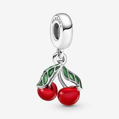 Add this cherry charm to your look for a vibrant pop of color. Crafted in sterling silver, this fruity dangle charm features a pair of ripe red cherries with detailed green leaves hand-finished in transparent enamel. Wear it alone or style it with other fruit charms to turn your favorite Pandora pieces into a medley of delectable, collectible sweet summer fruits. - Pandora Asymmetrical Cherry Fruit Dangle Charm - Enamel / Sterling silver / Red Elegant Red Jewelry With Dangling Charms, Red Fruit Design Dangle Jewelry, Red Dangle Jewelry With Fruit Design, Red Dangle Charms With Lobster Clasp, Cherry Charm, Cherry Fruit, Bracelet Pandora, Hearts Girl, Pandora Style