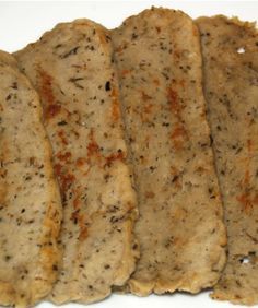 several slices of bread sitting on top of a white plate