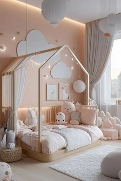 a child's bedroom decorated in pink and white