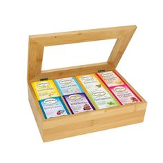 six teas in a wooden box on a white background