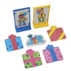 the sesame street characters stickers are all in different shapes and sizes, including gift boxes