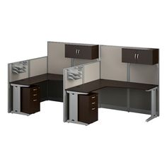 an office cubicle with two workstations and drawers