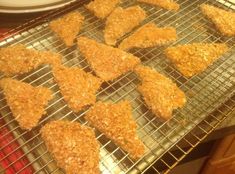 chicken nuggies cooling on a rack in the kitchen