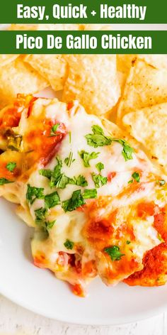 a white plate topped with lasagna and tortilla chips