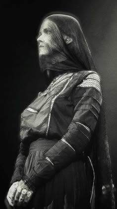 black and white photograph of a woman in costume