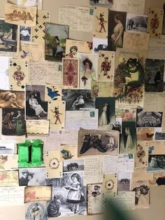 a wall covered with lots of pictures and papers