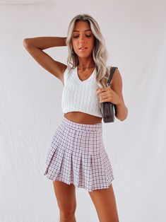 Model is wearing a small Pleated mini skirt Zipper closure Plaid detail throughout True to size Cable Knit Vest, Skirt Zipper, Maxi Styles, Custom Jacket, Plaid Skirt, Cute Simple Outfits, Pleated Mini Skirt, Plaid Skirts, Knit Vest