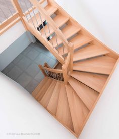 an overhead view of a wooden staircase