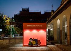 an orange and red display on the side of a building