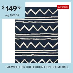 a blue and white rug with the words safavie kids collection geometric on it