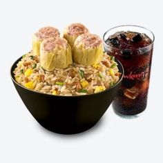 a bowl filled with rice next to a drink