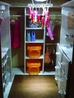 the closet is filled with lots of clothes and other things to put in it's storage area