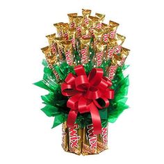 a bouquet of chocolates wrapped in red ribbon