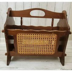 an old fashioned wooden toy basket with handles