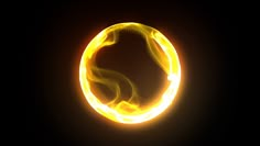 a circular object with yellow light in the middle on a black background that appears to be fire