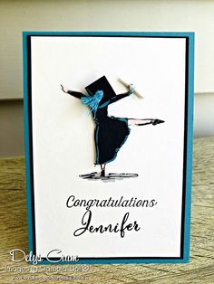 a handmade congratulations card with an image of a woman in a dress and hat