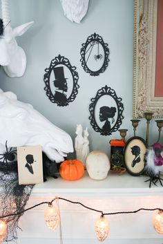 a mantle with halloween decorations on it