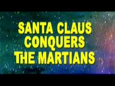 the title for santa claus conquers the martian, which is in yellow and blue