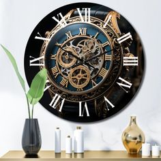 a black and gold clock with roman numerals sitting on a table next to a vase