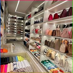 a store filled with lots of purses and handbags