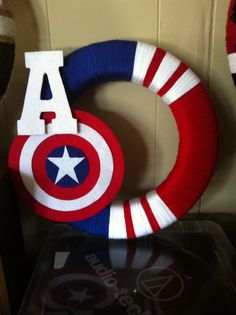 this is an image of a wreath made to look like the letter a for captain america