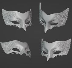 four white masks with wings on them