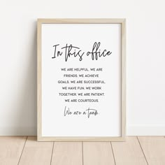 a black and white framed print with the words in this office on it's side