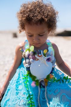 Sweet mermaid dress for a toddler!  Leotard underneath. Perfect for a toddler mermaid shoot. ✷        *    ˚ * .       *   * ⋆   .  *    ⋆     ˚ ˚    ✦ Shop Policies ✦     ⋆ *   *       ⋆ ✧    *   ✧ ✵    * ✵ Please examine pictures carefully and address any questions or concerns before placing an order.   Items are very delicate and made from natural materials, which are inherently not perfect.   Some of them smell like the ocean.  Please note all items are sold in their one-of-a-kind, as-is state. By purchasing you are affirming that you have reviewed the Care & Safety tips in Photos section of this listing.  ️🐚💓 Mermaid Costume Kids, Mermaid Top, School Dresses, Mermaid Costume, Mermaid Dress, Women's Costumes, Style Expert, Leotards, Mermaid