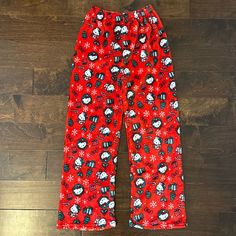 Super Cute And Very Soft Hello Kitty Pajama Pants In A Christmas Theme. Brand New And Never Worn, Without Tags. Size: Os (Would Likely Best Fit A Womens Small Or A Kids Xl/Xxl, Please Check Measurements To Ensure Appropriate Fit) Approximate Measurements: Waist (Unstretched): 12” Waist (Stretched): 15” Inseam: 27” Cozy Bottoms For Winter Sleepover, Cozy Bottoms For Sleepover In Winter, Red Holiday Long Pants, Red Long Pants For Holiday, Holiday Red Long Pants, Red Christmas Sleepwear With Long Pants, Christmas Loungewear Pants, Christmas Holiday Sleepwear With Long Pants, Christmas Holiday Long Pants Sleepwear