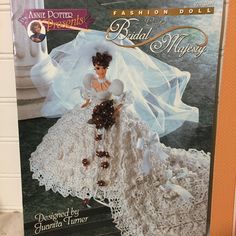 an image of a wedding doll in crochet and lace on the cover of a magazine