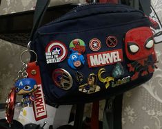 Spider-man Bag, Spiderman Bag, Marvel Accessories, Game Room Basement, Inside My Bag, Cap Decorations, Marvel Posters, Backpack Decoration, Crazy Outfits