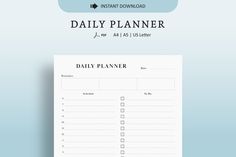 a daily planner is shown on a blue background