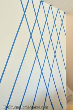 a room with blue lines painted on the wall