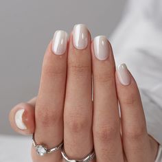 Sexy, cute, and passionate. These words come to mind at first glance when you see these nails. This Classic White color design is amazing. It will be the life of any party!They are made with high-quality materials that are comfortable and fully customizable to your nail, using included tools. Attached with non-toxic an White Gel Nails, Engagement Nails, Bridesmaids Nails, Squoval Nails, Short Square Nails, White Chrome