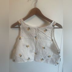 Very Summery, Light Crop Top With Flowers Cotton Cropped Tank Top With Floral Print, Cropped Cotton Tank Top With Floral Print, Cotton Floral Print Cropped Tank Top, Cute Yellow Sleeveless Top, White Floral Print Cotton Crop Top, Cute Cotton Tops For Daytime, Casual Cropped Yellow Tank Top, Yellow Floral Print Tank Top For Spring, Vacation Sleeveless Tops With Lemon Print