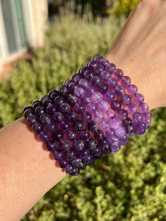 Click the link below to shop more Crystal Jewelry! https://www.etsy.com/shop/CrystallineEarthShop?ref=seller-platform-mcnav§ion_id=36709411 * Listing is for (1) bracelet and is approximately 7 inches. You may choose Light or Dark Amethyst. Amethyst crystals are one of the most beneficial stones to have in your home or office. These crystals work to purify any space of negative vibrations, emanating an energy ideal for you to thrive in. They help to clear the mind of unnecessary thoughts and clut Purple Bracelets With Gemstone Beads, Purple Bracelets With 8mm Beads As Gift, Purple Amethyst Stretch Bracelet As Gift, Amethyst Beaded Bracelets For Healing, Purple Amethyst Bead Jewelry, Purple 8mm Beads Bracelets As Gift, Purple Amethyst Bracelets, Hand Wrapped Purple Beaded Bracelet As Gift, Hand Wrapped Purple Beaded Bracelet For Gift