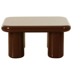 a brown and white table with two legs on it's sides, against a white background